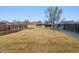 Spacious backyard with newly seeded grass and partial fencing at 11642 Moline Ct, Commerce City, CO 80640