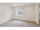 Basement area with finished flooring and natural light at 11642 Moline Ct, Commerce City, CO 80640