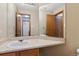 Bathroom featuring an extended vanity counter with a sink at 11642 Moline Ct, Commerce City, CO 80640