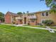 Charming condo exterior featuring well-maintained lawn and cozy balconies, perfect for enjoying the outdoors at 10251 W 44Th Ave # 8-102, Wheat Ridge, CO 80033