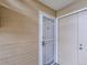 Exterior showcasing a storm door providing extra security and ventilation with neutral siding at 10251 W 44Th Ave # 8-102, Wheat Ridge, CO 80033