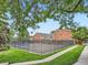 Community pool with secure fencing, surrounded by green space, perfect for relaxation at 10251 W 44Th Ave # 8-102, Wheat Ridge, CO 80033