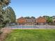 Community pool with secure fencing, surrounded by green space, perfect for residents to relax at 10251 W 44Th Ave # 8-102, Wheat Ridge, CO 80033