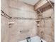 Close-up on shower area, highlighted by decorative tilework, and accessible grab bar at 10251 W 44Th Ave # 8-102, Wheat Ridge, CO 80033