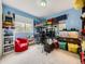 Bedroom with a loft bed, gaming setup, a window, and a red beanbag chair at 11526 Green Cir, Conifer, CO 80433