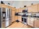 Modern kitchen with stainless steel appliances, ample cabinet space, and stylish countertops at 11526 Green Cir, Conifer, CO 80433