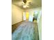 Bedroom with carpet, ceiling fan, and access to bathroom and closet at 17346 Nature Walk Trail # 105, Parker, CO 80134