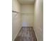Walk-in closet with wire shelving and carpet flooring at 17346 Nature Walk Trail # 105, Parker, CO 80134