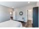 Spacious bedroom with a seating area, closet, and an en-suite bathroom with a shower at 20936 E 61St Ave, Aurora, CO 80019
