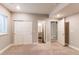 Spacious bedroom with soft carpet, windows, recessed lights and sliding closet doors at 20936 E 61St Ave, Aurora, CO 80019
