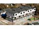 Modern townhome community with private driveways at 1682 Tabor St, Lakewood, CO 80215