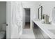 Modern bathroom with double vanity and walk-in shower at 1682 Tabor St, Lakewood, CO 80215
