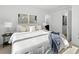 Main bedroom with ample natural light and en-suite bathroom at 1682 Tabor St, Lakewood, CO 80215