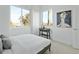 Bright bedroom with a queen-size bed and large windows at 1682 Tabor St, Lakewood, CO 80215