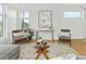 Relaxing living room with two armchairs and a coffee table at 1682 Tabor St, Lakewood, CO 80215