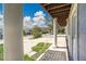 Inviting porch with sturdy columns offers a welcoming entrance with views of the charming neighborhood at 15805 W 14Th Pl, Golden, CO 80401