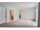 Spacious bedroom with two doors providing access to other parts of the house at 2504 S Victor St # E, Aurora, CO 80014