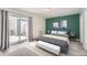 Bright and spacious bedroom with walkout slider door leading to a small patio at 2504 S Victor St # E, Aurora, CO 80014