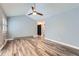 Cozy living room featuring vaulted ceilings and warm, inviting natural light at 2504 S Victor St # E, Aurora, CO 80014