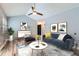 Bright living room with modern furnishings, stylish decor, and ample space at 2504 S Victor St # E, Aurora, CO 80014
