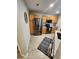 Kitchen with stainless steel appliances, wood cabinets, and luxury vinyl flooring at 5755 N Genoa Way # 14-105, Aurora, CO 80019