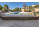Community pool surrounded by a concrete patio, a perfect place to gather and relax at 5755 N Genoa Way # 14-105, Aurora, CO 80019