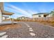 A backyard featuring stone landscaping and stone walkways at 4063 Castle Vista Dr, Castle Rock, CO 80104