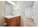 Bathroom with single sink vanity and chrome fixtures at 4063 Castle Vista Dr, Castle Rock, CO 80104