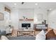 Inviting living room features a modern fireplace, comfortable seating, and plenty of natural light at 4063 Castle Vista Dr, Castle Rock, CO 80104