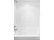 Clean, all-white bathroom featuring a modern tub and shower with tiled walls at 879 Delaware St, Denver, CO 80204