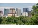 Stunning city view showcasing the skyline and lush greenery, offering a picturesque urban panorama at 879 Delaware St, Denver, CO 80204