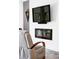 Inviting living room featuring a modern electric fireplace and wall-mounted TV at 879 Delaware St, Denver, CO 80204