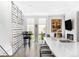 Open-concept space with modern design, featuring a kitchen island and a stylish living area at 879 Delaware St, Denver, CO 80204