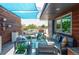 Inviting patio with ample seating and shade, perfect for outdoor entertaining and relaxation at 879 Delaware St, Denver, CO 80204