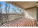 Covered balcony with wood decking and views of the surrounding landscape at 12288 W Dorado Pl # 301, Littleton, CO 80127