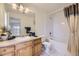 Bathroom featuring a vanity with mirror and a shower-tub combination at 12288 W Dorado Pl # 301, Littleton, CO 80127