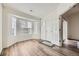 Spacious living room with bay window and wood-look flooring at 12288 W Dorado Pl # 301, Littleton, CO 80127