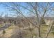 Scenic view of neighborhood homes with mature trees at 12288 W Dorado Pl # 301, Littleton, CO 80127