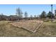 Community sand volleyball court surrounded by grass at 12288 W Dorado Pl # 301, Littleton, CO 80127