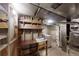 Unfinished basement with utility sink, washer, dryer, and plenty of room for storage at 820 Cottonwood Ave, Centennial, CO 80121