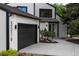 Charming exterior of home featuring detailed design elements and an attached garage with private driveway at 5516 S Havana Ct, Englewood, CO 80111