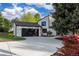 Beautifully designed home featuring a well-manicured lawn and an attached garage with a private driveway at 5516 S Havana Ct, Englewood, CO 80111