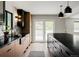 Spacious kitchen features modern cabinets, a black countertop, and sleek stainless steel appliances at 5516 S Havana Ct, Englewood, CO 80111