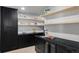 Well-organized walk-in pantry with ample shelving, cabinetry, and counter space, great for storage at 5516 S Havana Ct, Englewood, CO 80111