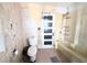 Bathroom including a toilet and shower at 11897 Roxburg St, Strasburg, CO 80136