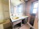 Bathroom featuring a dual sink vanity at 11897 Roxburg St, Strasburg, CO 80136