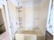 Bathroom showing the shower and tile at 11897 Roxburg St, Strasburg, CO 80136
