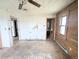 Bedroom with attached bathroom and natural light at 11897 Roxburg St, Strasburg, CO 80136