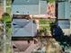 Drone view of the home's roof, backyard, and patio area with furniture at 424 S Pennsylvania St, Denver, CO 80209