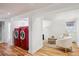 Finished basement area with hardwood floors, recessed lighting, laundry, and stylish seating at 424 S Pennsylvania St, Denver, CO 80209